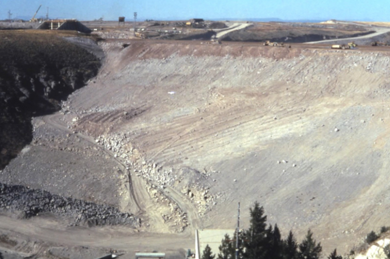 Figure 2. The Dam as it looked nearing completion in May, 1976. The view is toward the right abutment where the breach occurred. Source of photo: Rogers, J. David (?) Retrospective on the Failure of Teton Dam Near Rexburg, Idaho June 5, 1976. Missouri University of Science and Technology: Teton Dam Failure, slide show